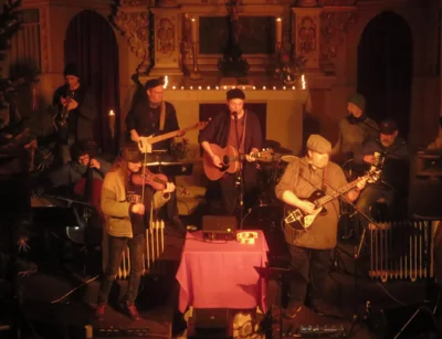 Foto des Albums: Die LIEDERTOUR zu Gast in der Stadtkirche mit Ralph Schüller & Band feat. Miko Mikulicz an der Geige