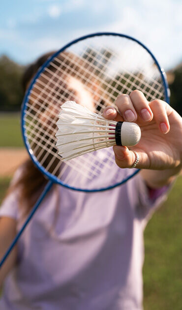 Frau mit Federball