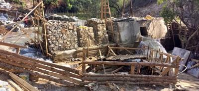 Foto zur Meldung: Wasserkraftwerk Tandala - Steine, Stahl und Beton