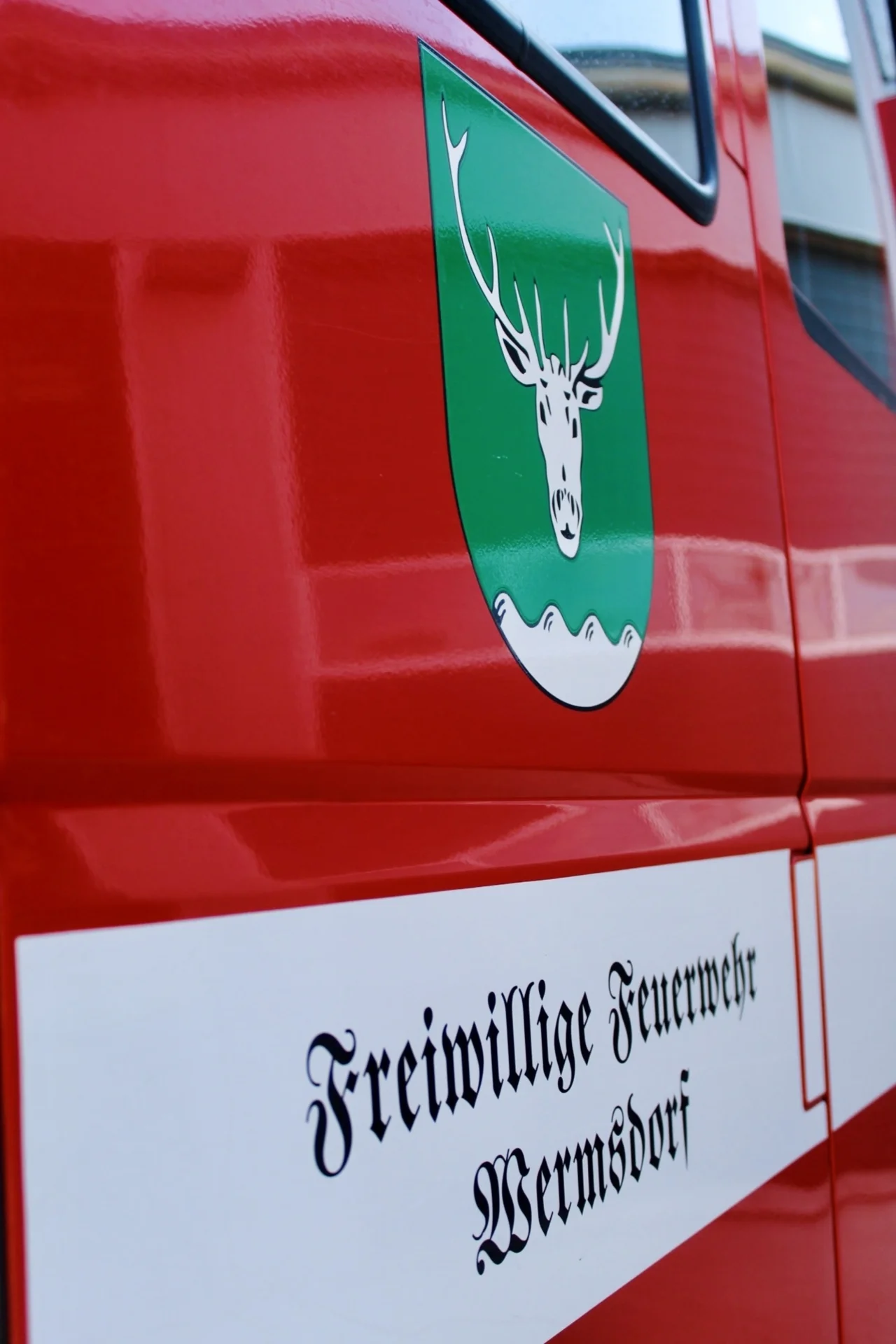 Wappen und Schriftzug