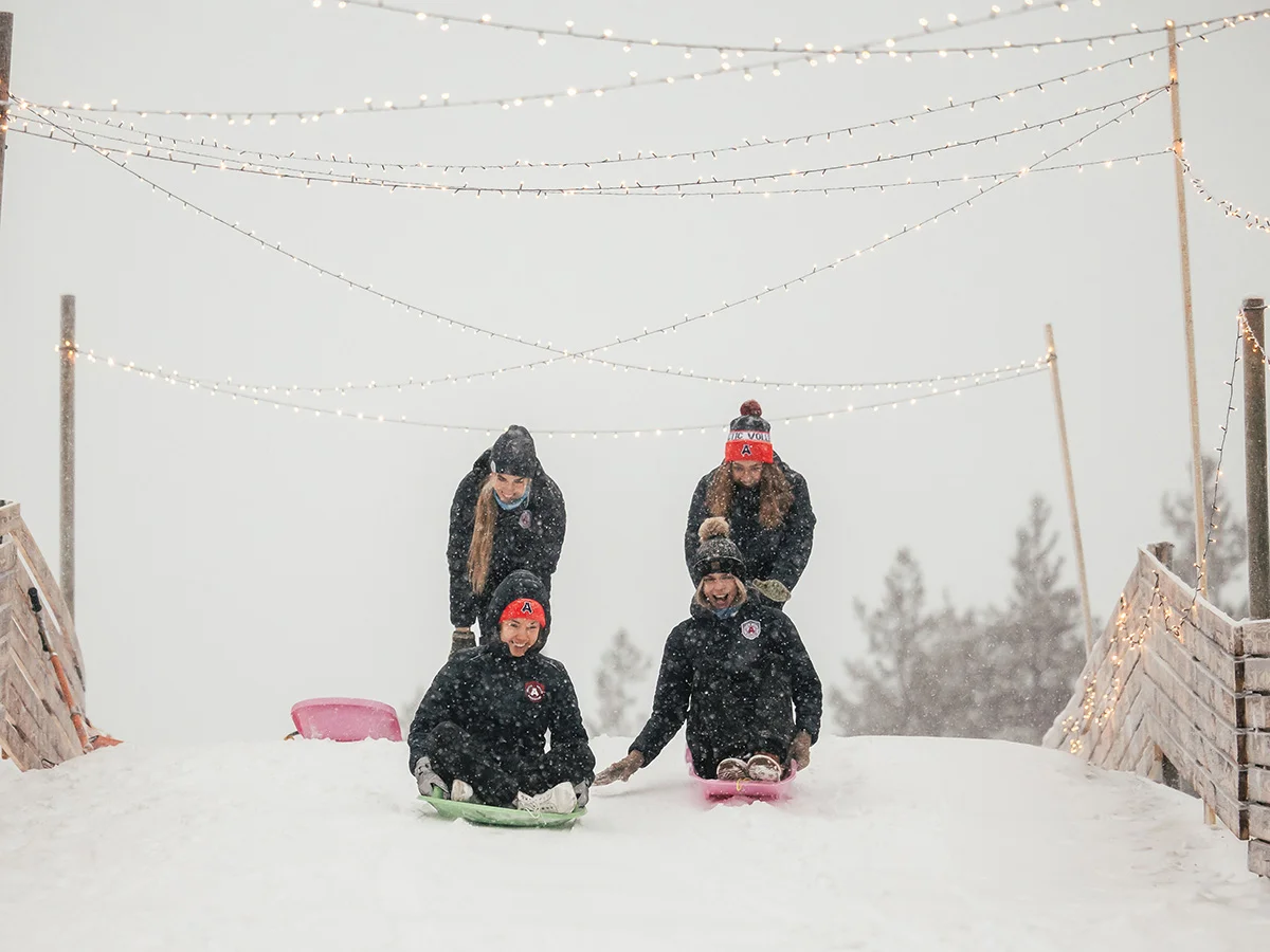 Lapland WInter Park sledding with friends