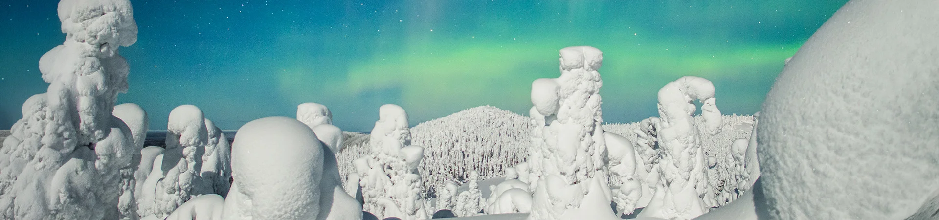ruka-kuusamo_Aurora_Borealis_Valtavaara_Maria_Mikkonen 1920 x 450 px