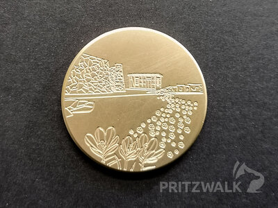 Die Medaille im Monat M&auml;rz zeigt ein Blumenband an der Tuchfabrik. Foto: Beate Vogel  (Bild vergr&ouml;&szlig;ern)