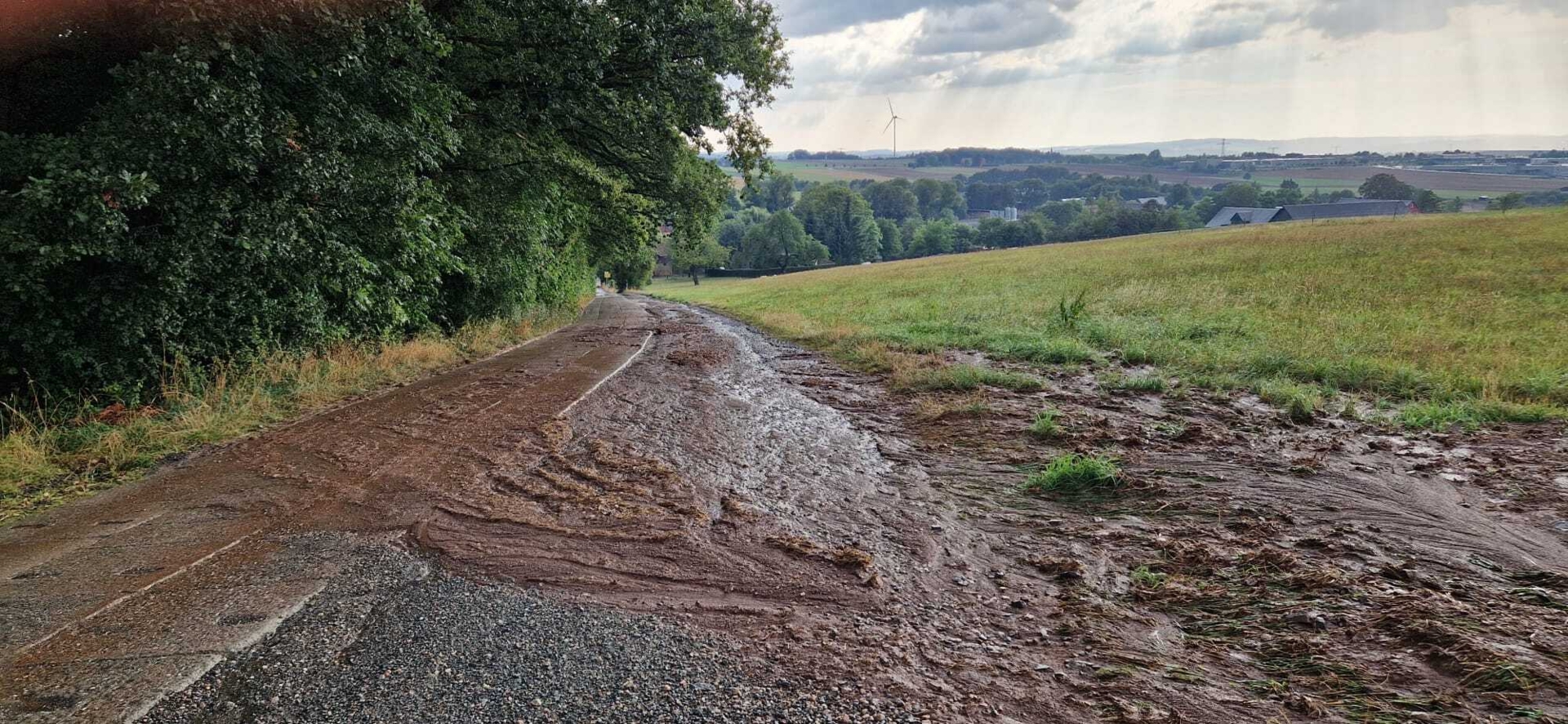 Bild: Zufahrt Straße der Befreiung/Holzberg – Ausschwemmungen