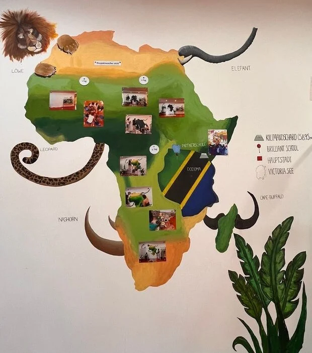 Bild: Afrikakarte mit Fotos Projektwoche
