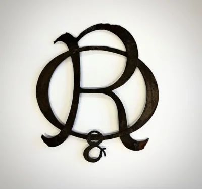 Firmenschild des Neuruppiner Bilderbogenverlages Oehmigke & Riemschneider, Museum Neuruppin (Bild vergr&ouml;&szlig;ern)