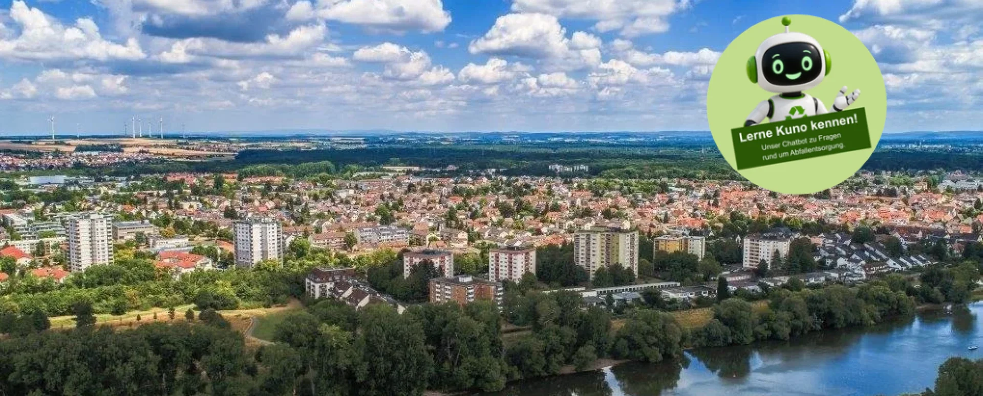 Das Bild zeigt die Ansicht auf den Stadtteil Dörnigheim mit dem Main im Vordergrund. Eingebunden ist ein Link zum KI-Abfallberater Kuno. | zur Startseite