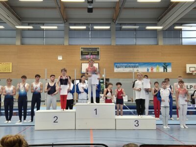 Siegerehrung. In der Mitte Jamie, links der Zweit- und rechts der Drittplatzierte