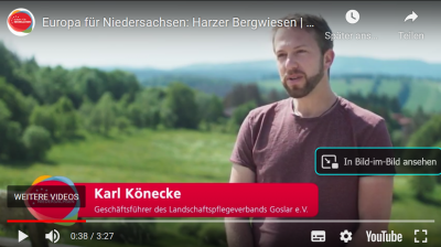 Karl Könecke im Gespräch (Screenshot aus dem verlinkten Video)