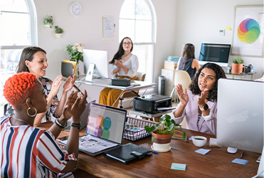 diverse-successful-business-team-clapping