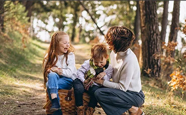 young-mother-with-daughter-son-forest