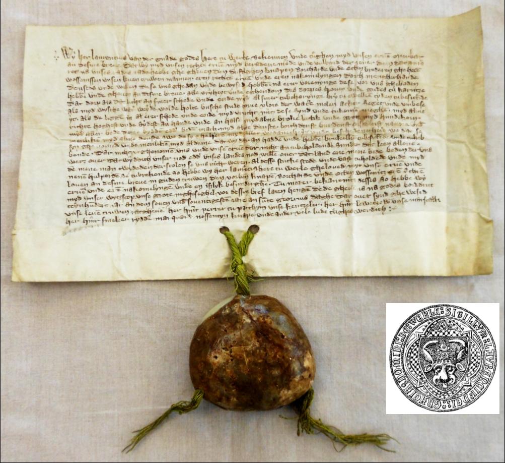 Die Urkunde vom 23.4.1377. An einem aus grüner Seide gedrehten Strang hängt das Siegel des Fürsten Lorenz von Werle in geläutertem Wachs.