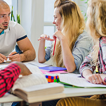 cheerful-students-working-new-project