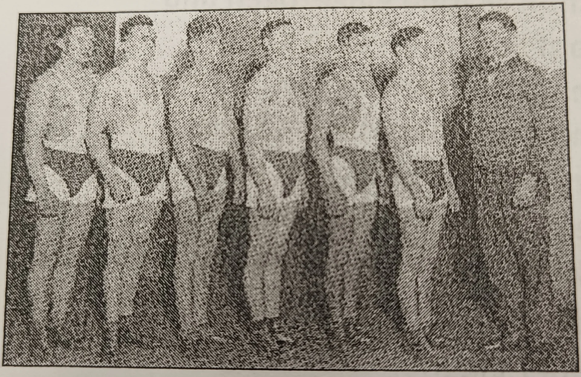 Abbildung 7: „Reinhold Liesegang in seiner Ringerriege (Zweiter von links)“ [6, S. 56]