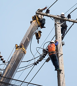 selective-focus-electricians-are-fixing-power-transmission-line-electricity-pole